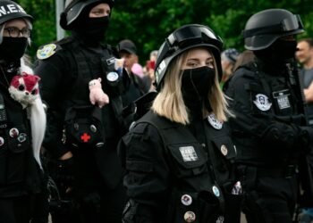 woman in black uniform