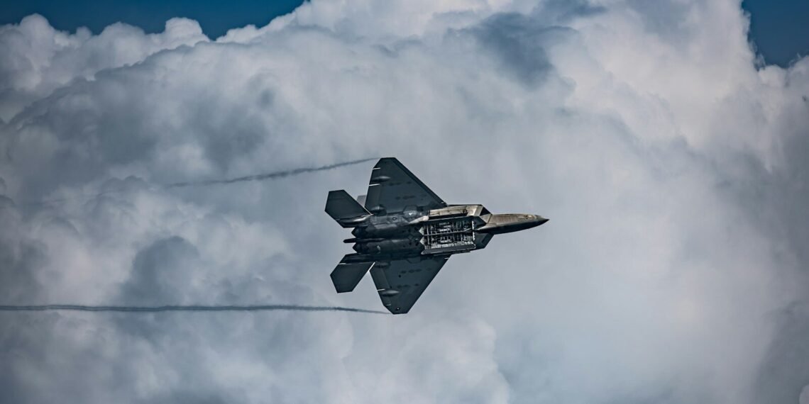 a fighter jet flying through the air