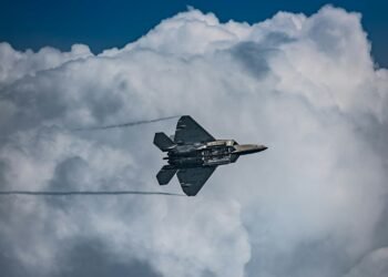 a fighter jet flying through the air