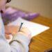 person using pencil