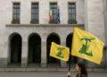 Giovane indagata a Milano per bandiera Hezbollah: il contesto